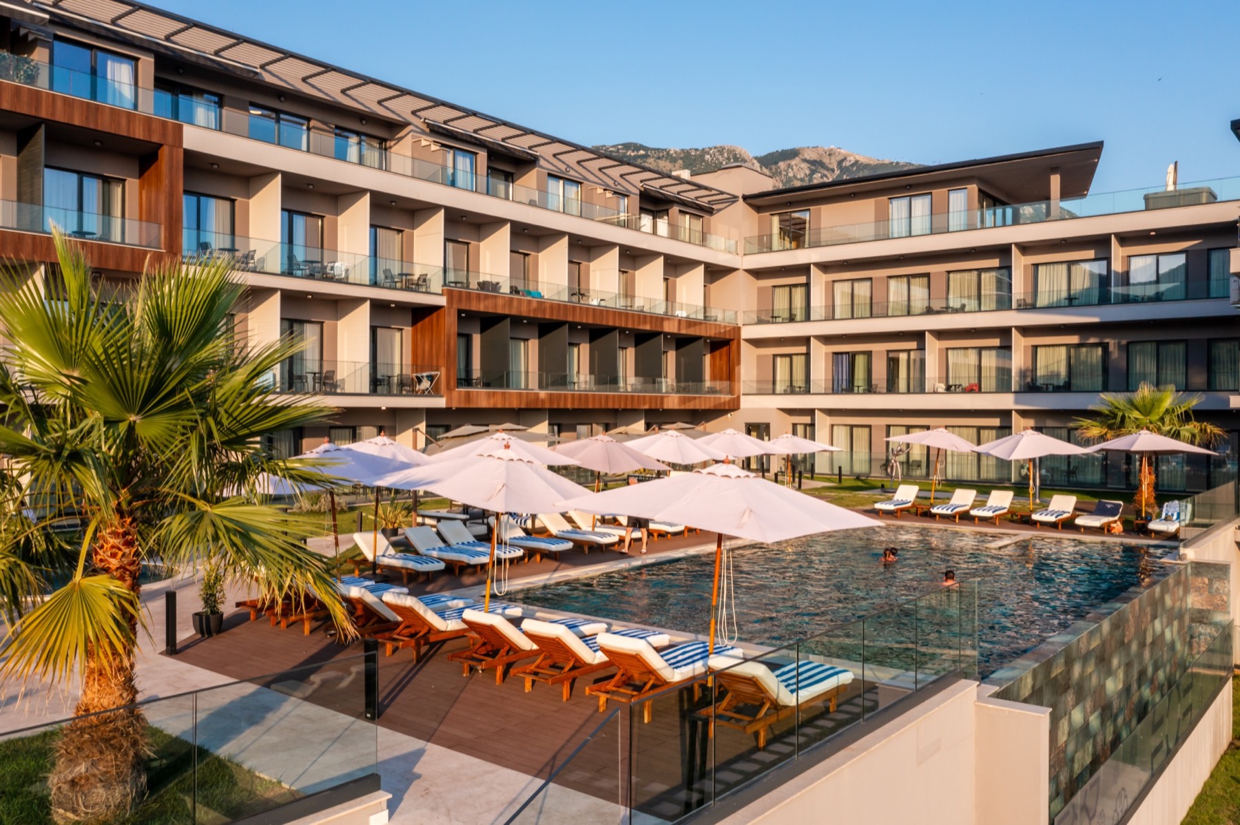 Royal Blue Resort and Residences apartments surrounding the outdoor pool